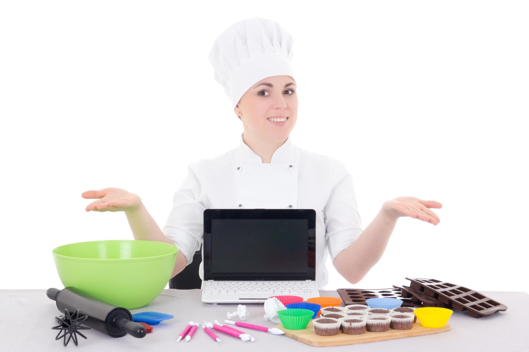 Chef teaching online in a bright kitchen